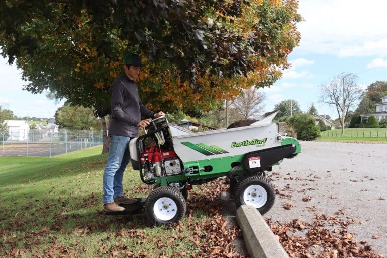 410 Topdresser self propelled over a curb