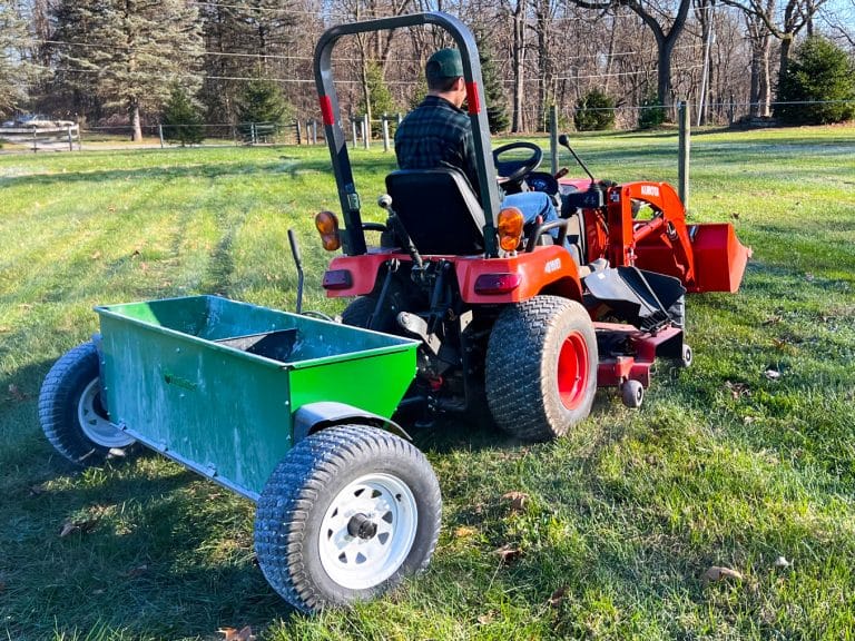 heavy duty drop spreader form earth and turf towed by lawn tractor