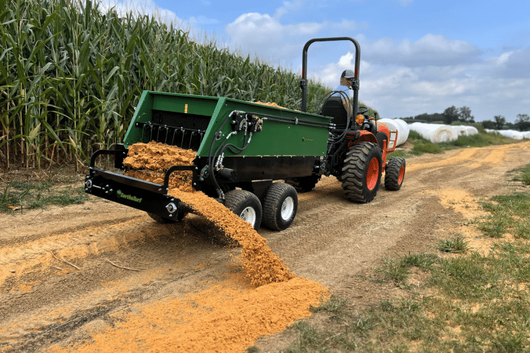 320 compost spreader spreading sand