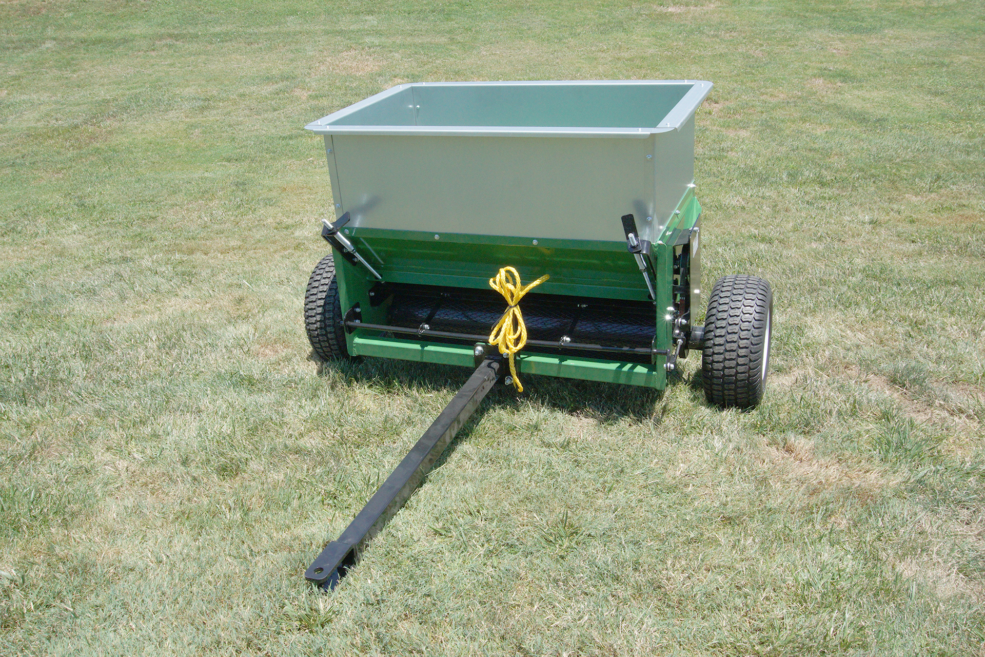 Earth & Turf TruFlow 36d tow-behind topdresser.