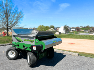 415 SP in front of a baseball field where it topdressed